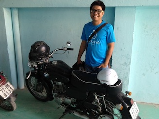 Loc, Founder of Aothun, with his 250cc BMW motorcycle Loc, Founder of Aothun, with his 250cc BMW motorcycle