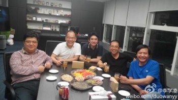 Titans of industry: Kingsoft, YY, and Xiaomi execs apparently celebrating the finalized deal.