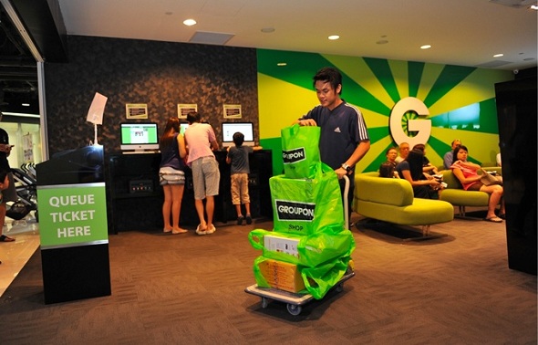Groupon-customer-leaving-the-Groupon-Shop-after-redeeming-his-items_lowres daily deals