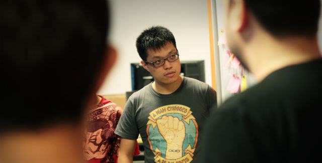 Gameplay programmer Benjamin Chua in a work meeting - or scrum.
