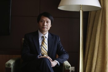 Lei Jun, founder and CEO of China's mobile company Xiaomi, poses for photo ahead of an interview in Chengdu