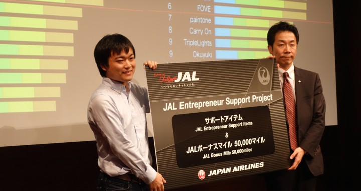 CEO Shinya Shimizu accepting the first place prize at JapanNight VII