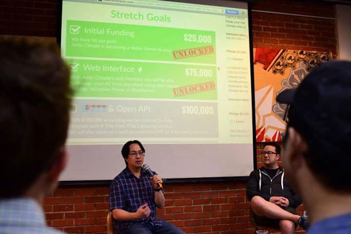 Julian Lee of Ambi Climate speaks while interviewer Casey Lau of SoftLayer listens.