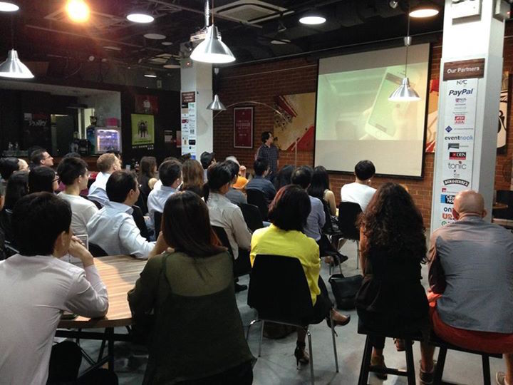 The crowd watches a crowdfunding video of Ambi Climate.