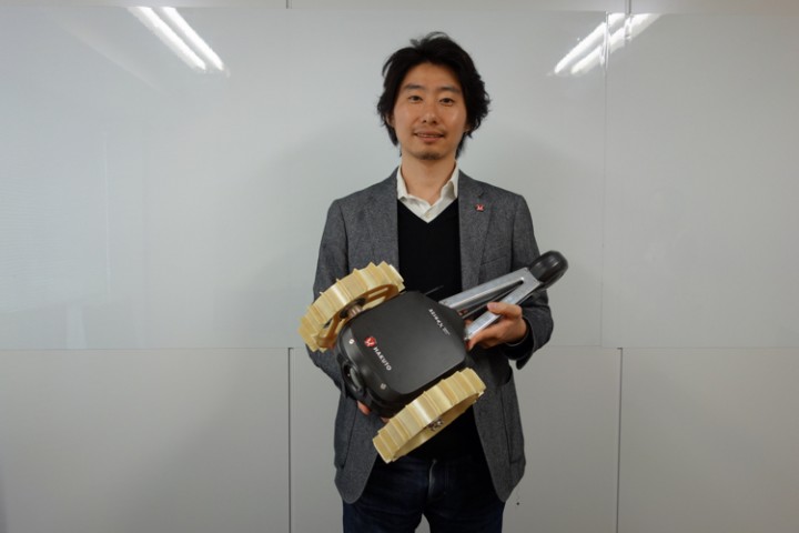 Takeshi Hakamada holding the