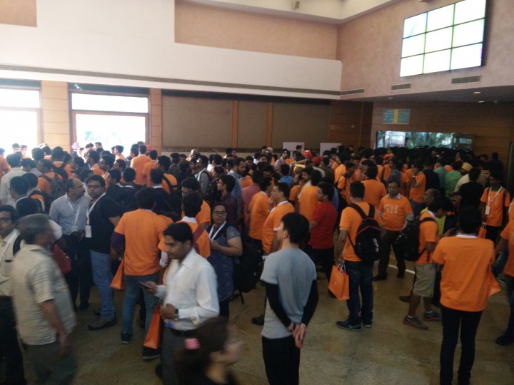 Attendees at the Xiaomi premiere in Delhi collect their Mi bands