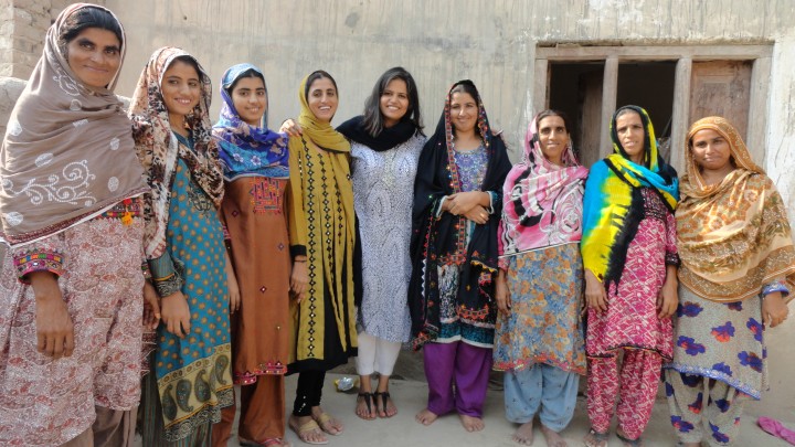 Innaya founder Naushaba Brohi flanked by her team of rural artisans