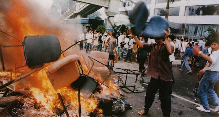 Shops were looted and goods burned on the streets during the 1998 riots in Jakarta, which eventually led to the ouster of dictator Suharto. Source: Wikipedia