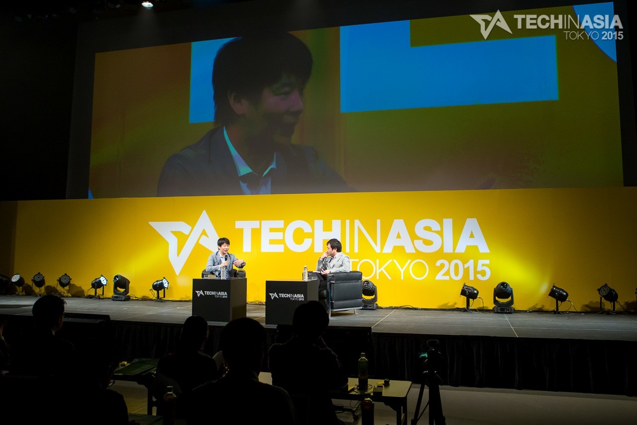 Koichiro Yoshida, Crowdworks founder and CEO, speaks on stage at Tech in Asia Tokyo 2015