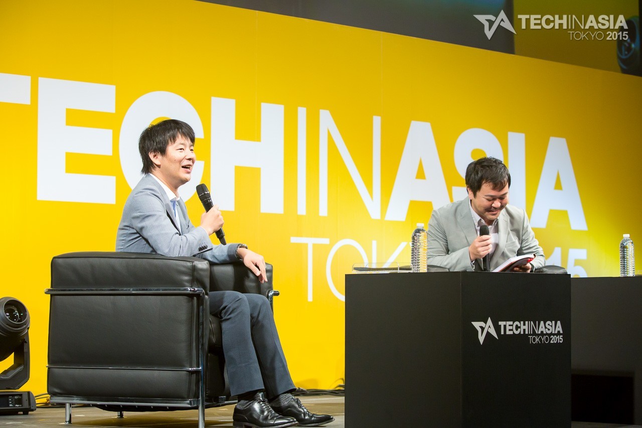 Koichiro Yoshida, founder and CEO of Crowdworks, on stage at Tech in Asia Tokyo 2015