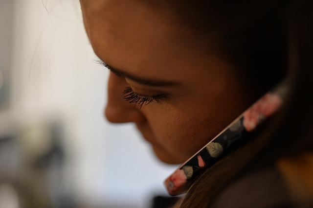 cellphone held up to face