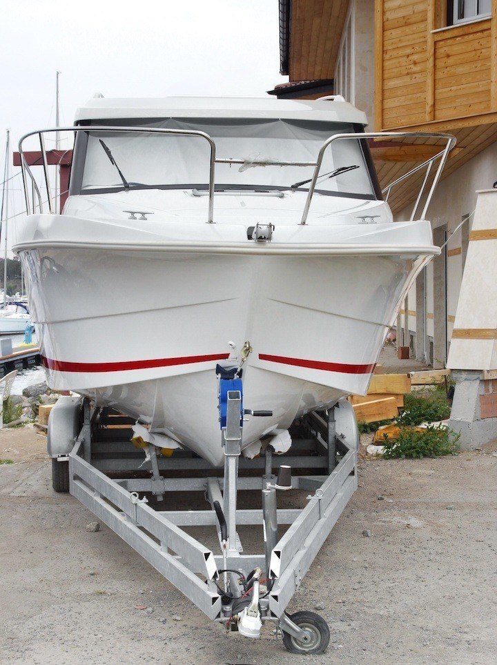 New Boat on a Trailer in a Shipyard