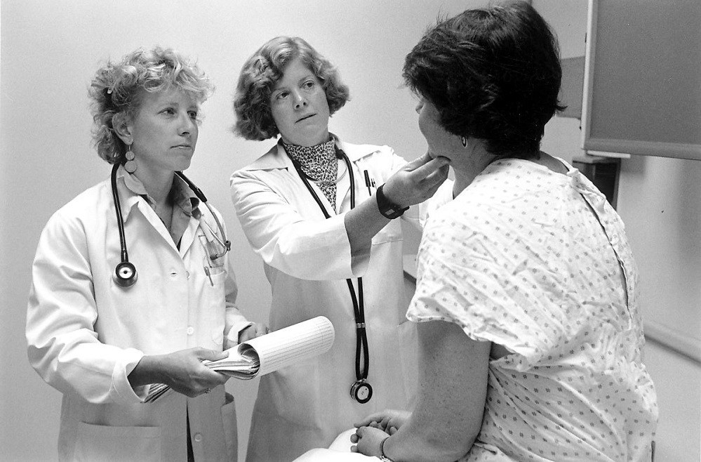 Doctors with patient