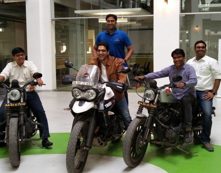 (Standing on bike in blue T-shirt) Sumit Jain, cofounder and CEO of CommonFloor, after its acquisition by Quikr, last week.