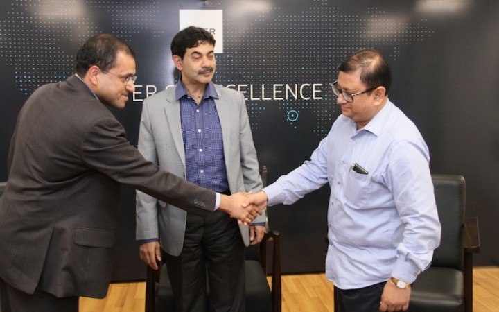 Uber India president Amit Jain with Jayesh Ranjan, IT secretary, and Sandeep Sultania, transport commissioner.