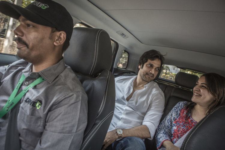 Avadesh Kumar Sha, a DriveU chauffeur, drives Arshed Syed and his wife Mumtaz.