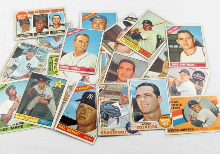 Each card representing a player. Image Source: liveauctiongroup