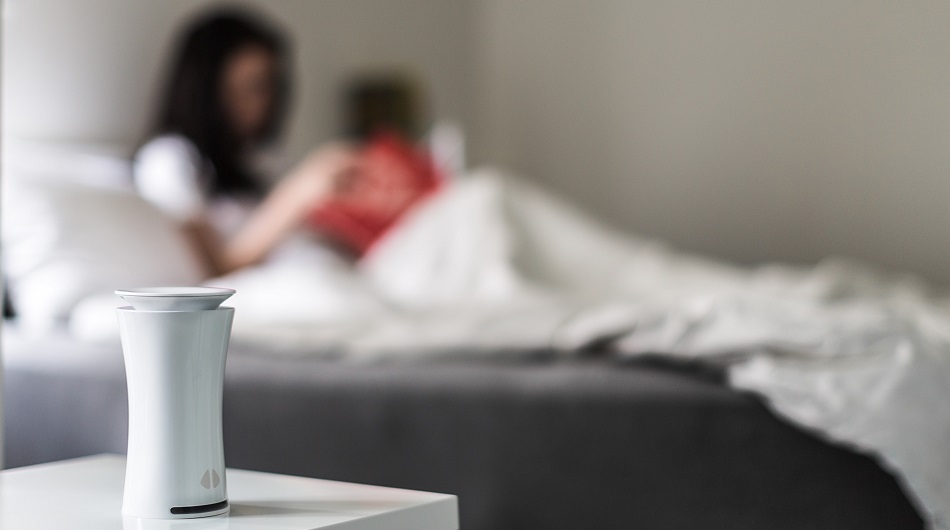 uHoo air quality monitor in the bedroom