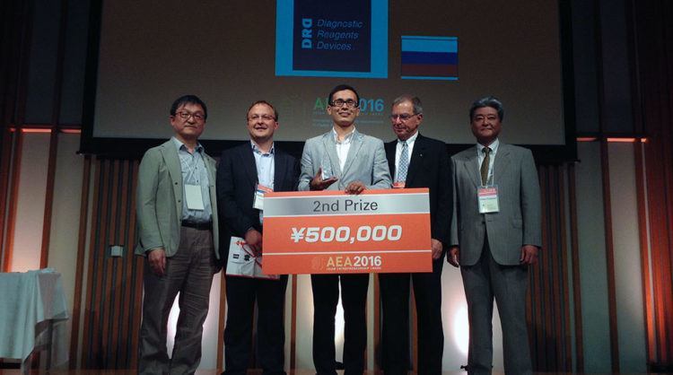 DRD Biotech receiving its prize with CEO Anzhey Zhimbiev in the center. AEA 2016