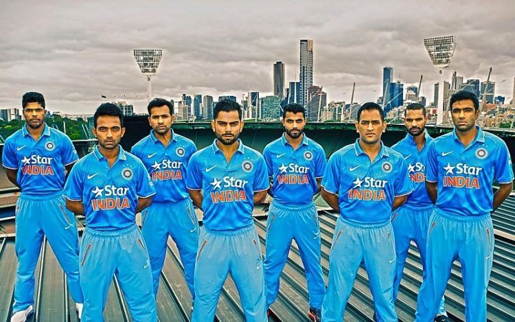 With teammates: Fourth from left: Virat Kohli. 