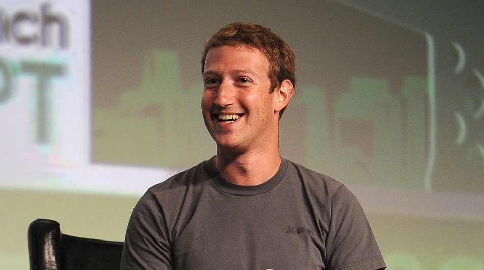Zuckerberg, laughing