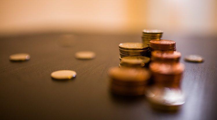 Money stacked on table