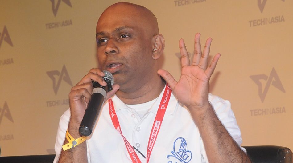 Flutura CEO and co-founder Krishnan Raman speaking at Tech in Asia Bangalore 2016