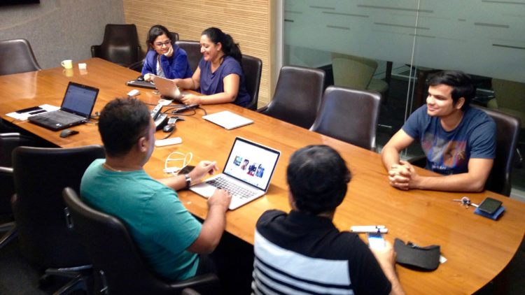 Part of the Mobmerry team meets in their Bangalore office. Krishna wears the green shirt. Photo credit: Tech in Asia.