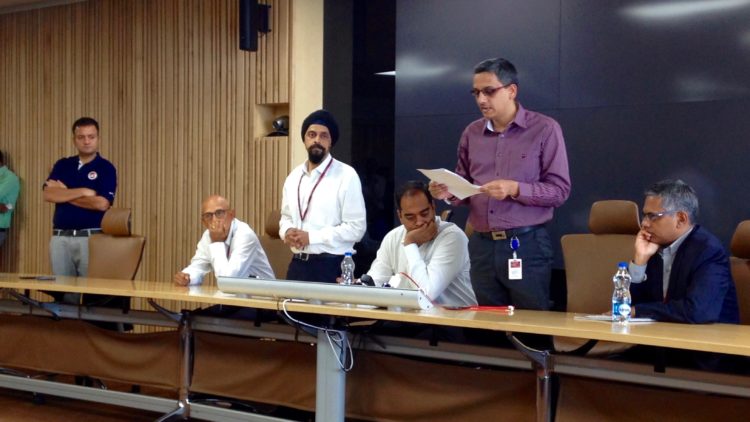 Mu Sigma management reads aloud official statements at the press conference yesterday. Dhiraj stands on the left. Photo credit: Tech in Asia.