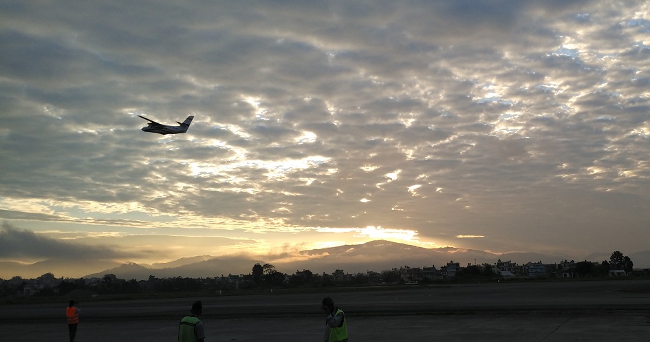 The first mountain flight to Everest takes off at dawn. Photo credit: Sumit Chakraberty