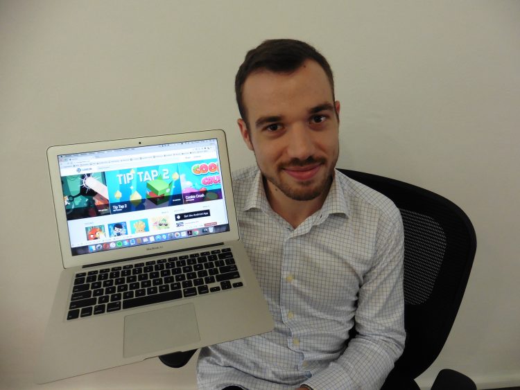 Mr Benoit Sommerlad, chief operating officer of Media Loyal, with the Game On website on his laptop.