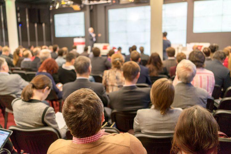 A business conference and presentation. Photo credit: elen1 / 123RF Stock Photo.