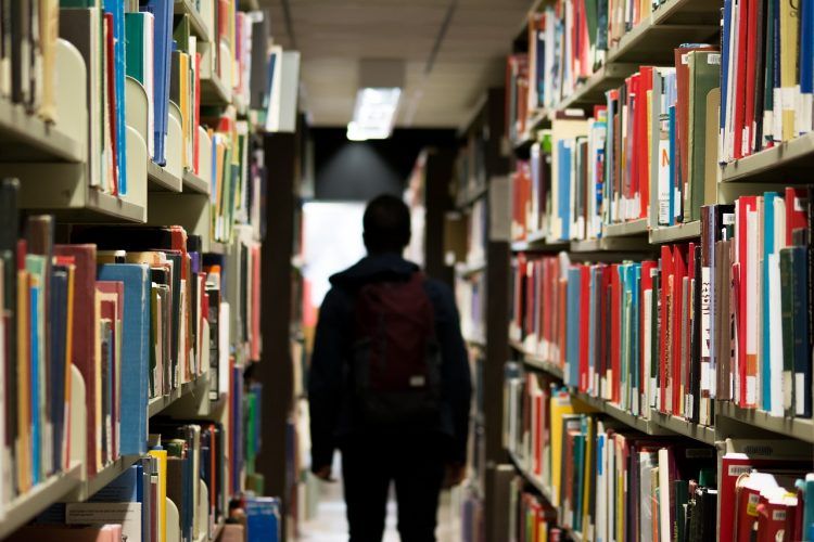 student in a library