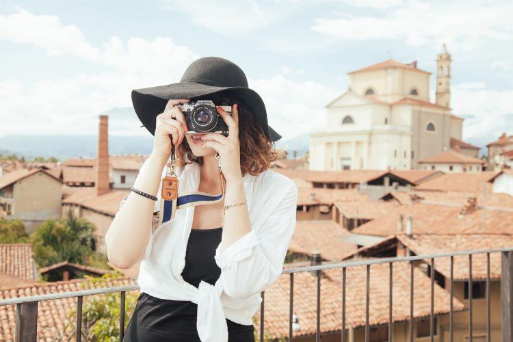 female tourist taking a photo