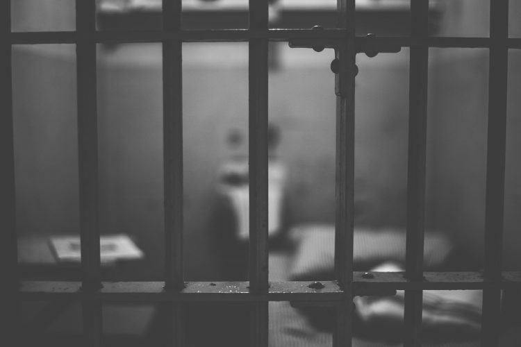 black and white prison cell