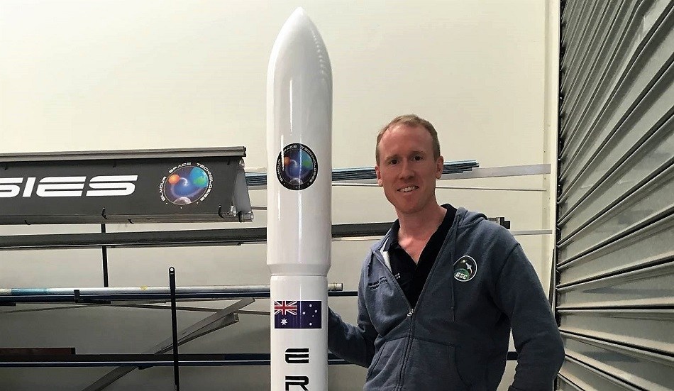 Gilmour Space CEO Adam Gilmour with the Eris rocket