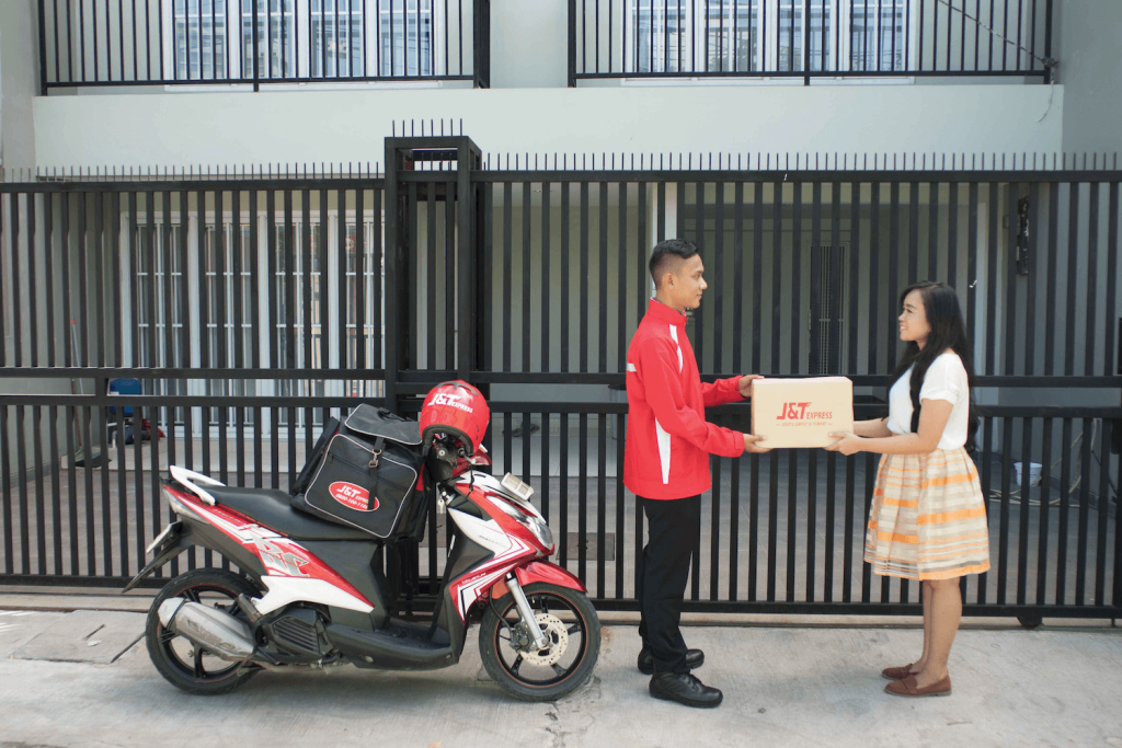 For Indonesia’s Couriers, Cash On Delivery Is A Headache