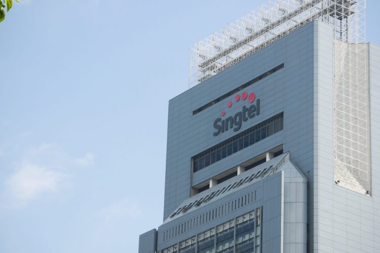 Singtel annual profit climbs 12% despite missing estimates